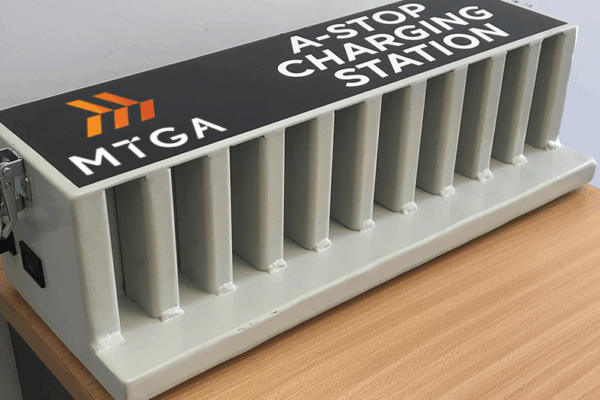 A robust charging station to charge Caterpillar A-stop units in the field
